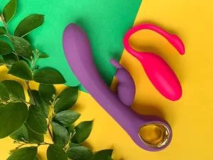 sex-toys-two-vibrators-on-a-yellow-background-useful-for-adult-sex-shop.jpg